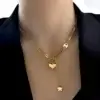 Collier Cœur Étoile au cou d'une femme