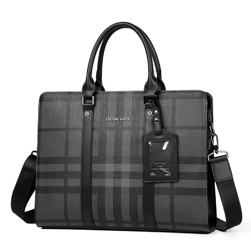 Sac à main business en cuir avec poignées robustes et bandoulière amovible, parfait pour un usage mains libres ou en mode sac à main élégant.