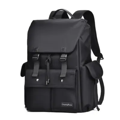 Sac à dos business en tissu résistant noir, avec compartiment pour ordinateur portable, poches extérieures et design sobre — idéal pour les professionnels modernes.