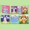 Livre-puzzle magnétique rose avec 3 scènes d’animaux mignons : lapin, éléphant et chien — idéal pour stimuler l’imagination et la concentration dès 18 mois.
