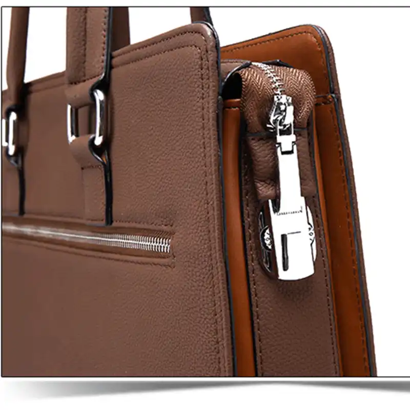 Détail de la fermeture éclair latérale du sac business antivol — conception robuste avec tirette métallique pour une sécurité maximale contre les vols.