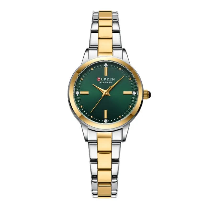Montre Curren Blanche 9094 pour femme : cadran vert profond, lunette dorée, aiguilles dorées et strass aux positions 3, 6, 9 et 12 — design sophistiqué et moderne.