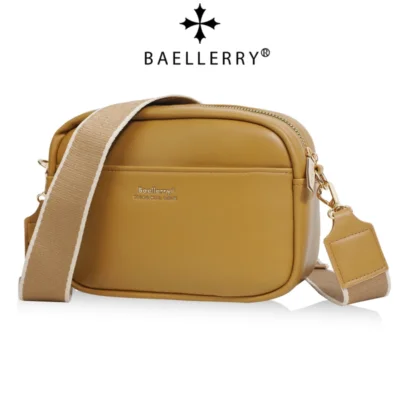 Sac bandoulière femme Baellerry petit format en simili-cuir moutarde, fermeture éclair dorée, bandoulière textile amovible et logo discret — design élégant et pratique pour le quotidien.