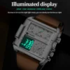 Vue de nuit de la montre OLEVS 1101 activant le mode éclairage LED vert et les aiguilles luminescentes pour une lecture facile de l'heure dans l'obscurité.