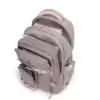 Intérieur organisé du sac à dos scolaire grande capacité montrant les multiples compartiments remplis de cahiers, livres et fournitures — design ergonomique et pratique pour l'école.